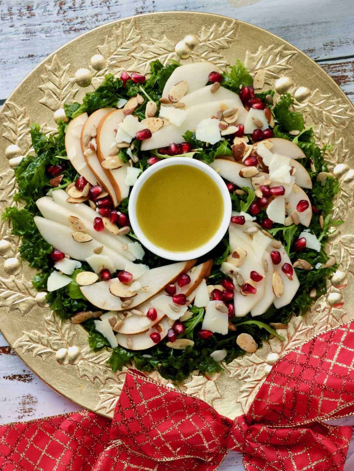 pear salad on gold platter with red bow