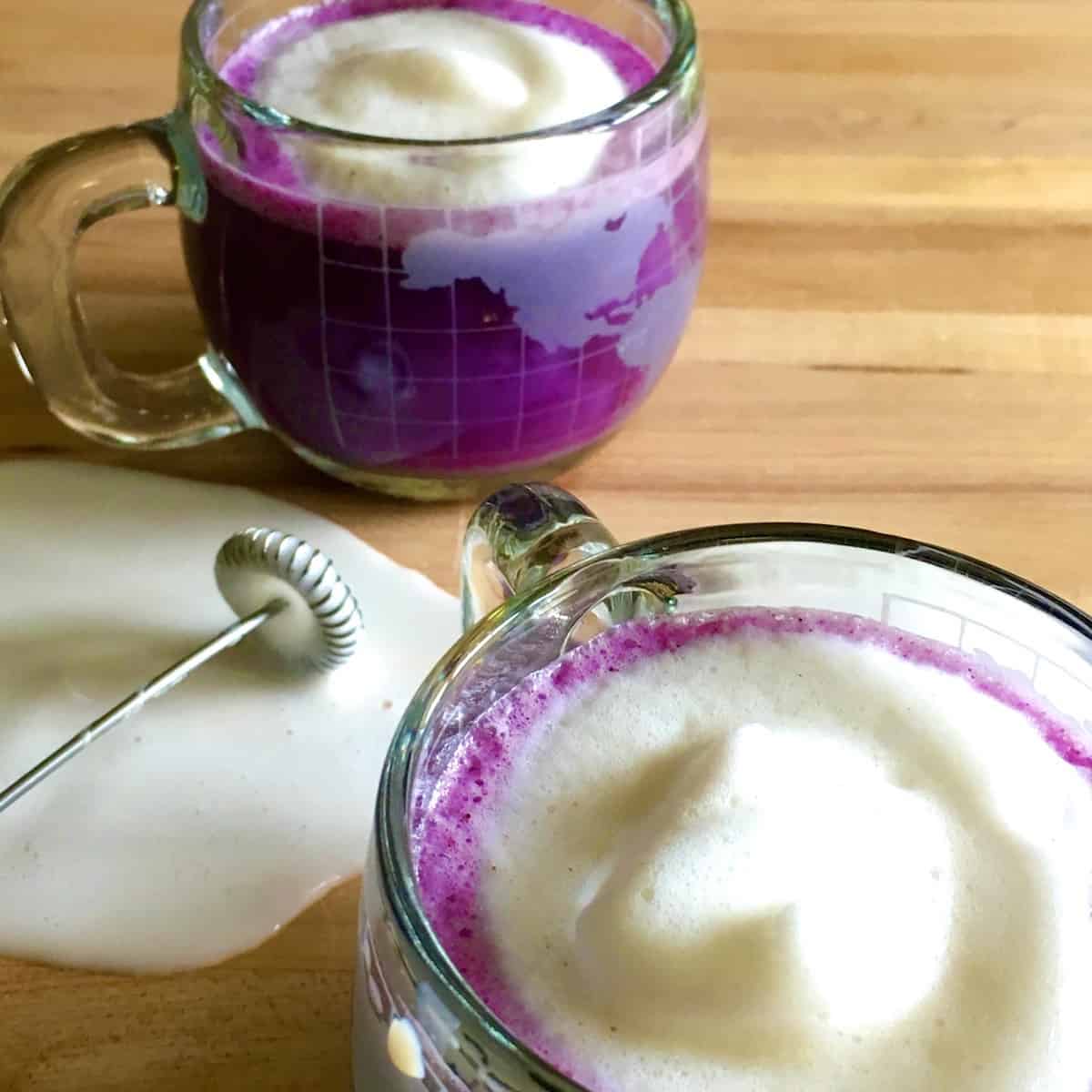 blueberry latte with spilled milk