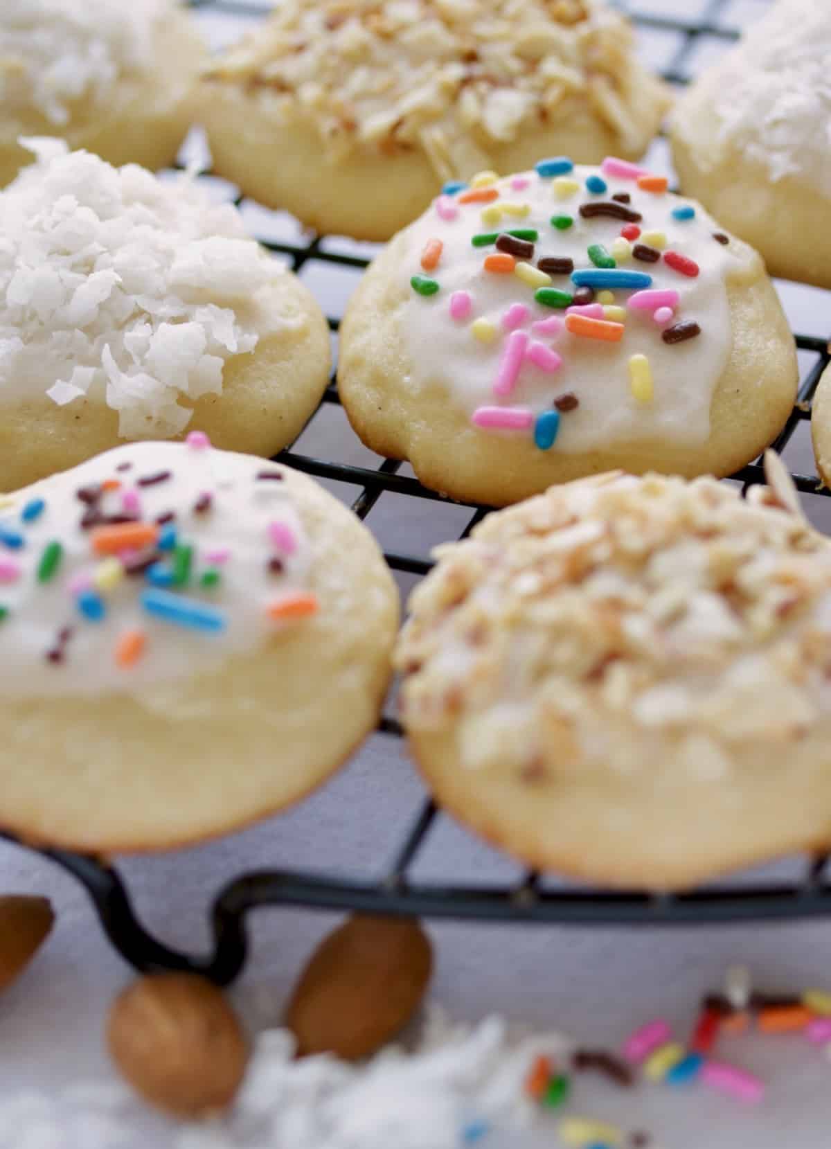 Italian Easter cookies on cooling rack with almonds