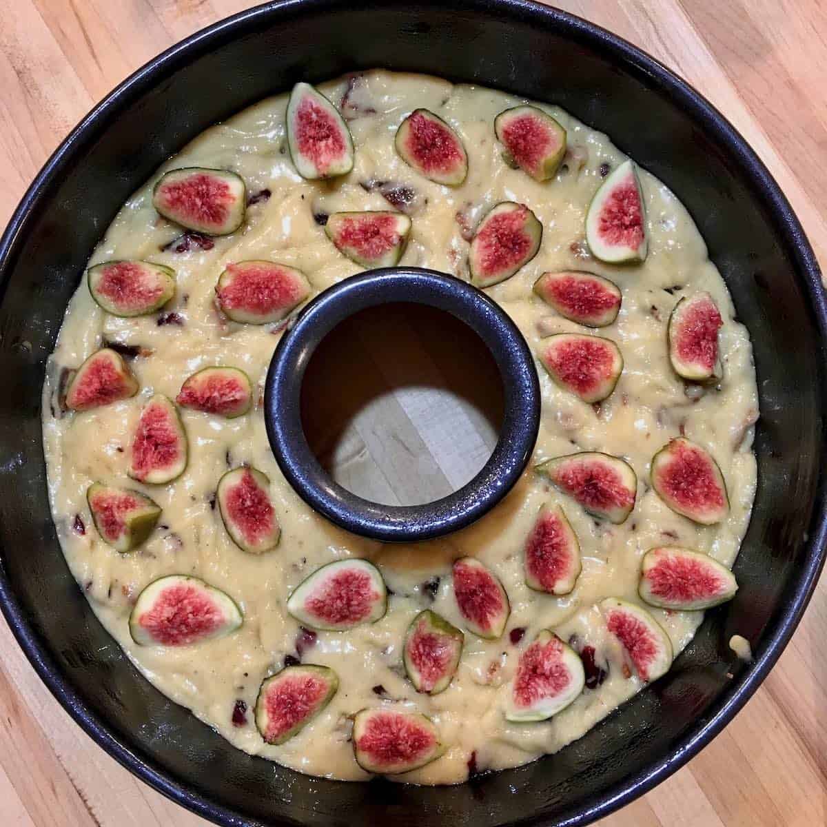 unbaked fig cake in pan