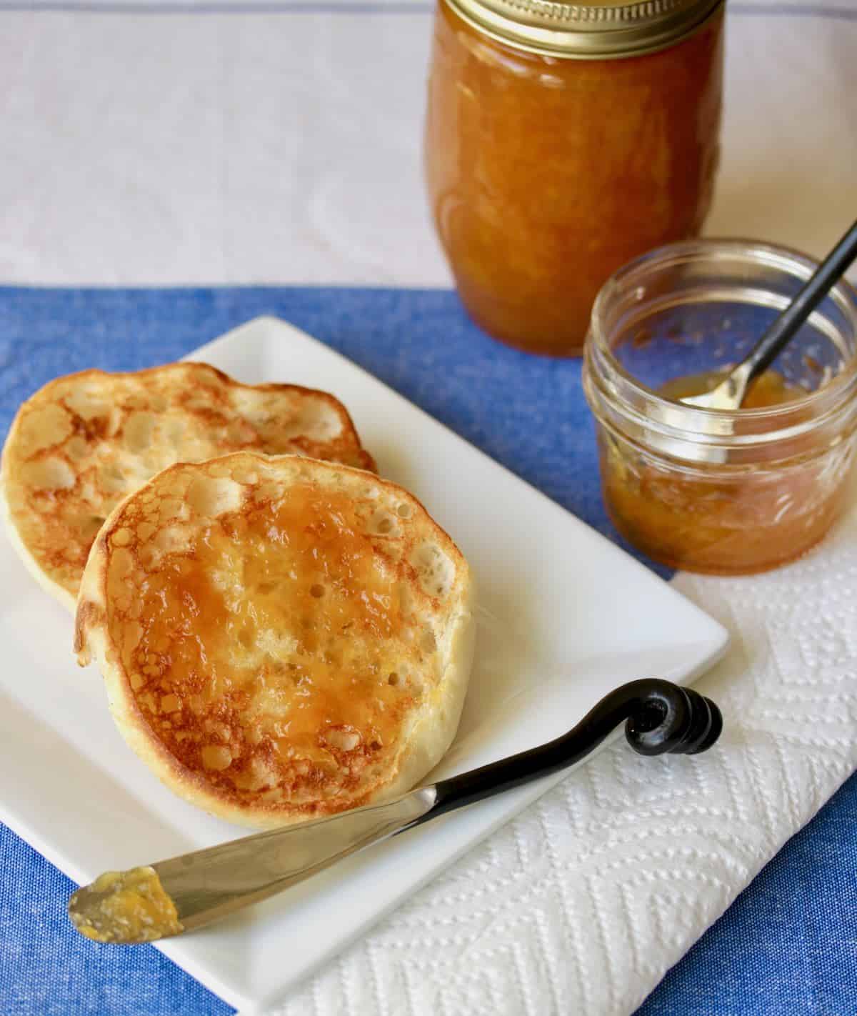 toasted English muffins with spirited peach jam