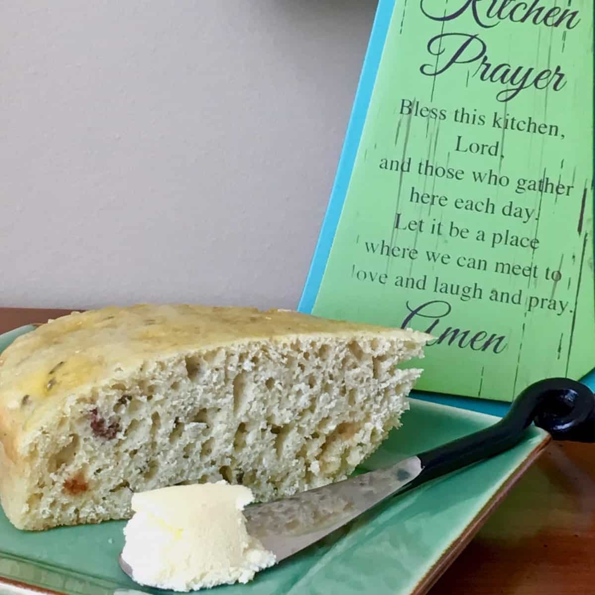 Kitchen prayer and plate of sliced Irish soda bread and butter