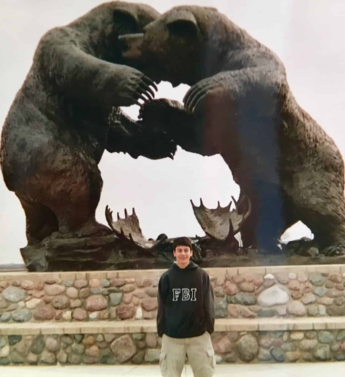 my son at bear sculpture