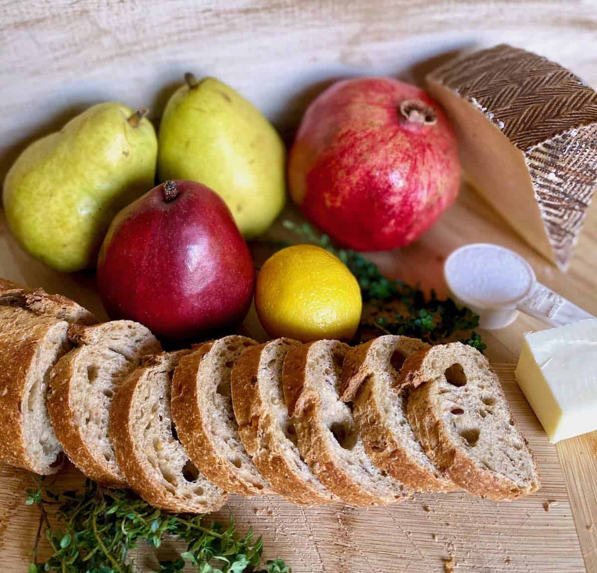 pear crostini recipe ingredients: pears, bread, cheese, pomegranate, thyme, sugar, lemon